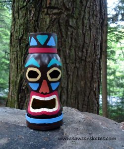 How to make a recycled coffee container tiki statue with solar light tutorial