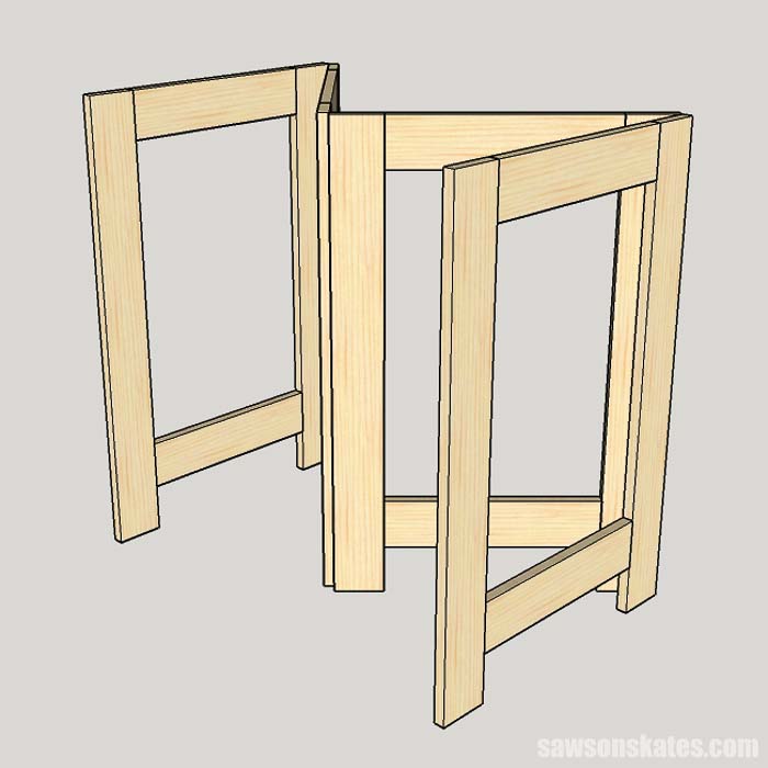 The hinges attach to the legs of the folding workbench and form a "W"