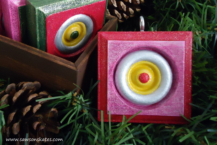 Wood rosettes are transformed into DIY Christmas ornaments. So easy and they make great gifts!