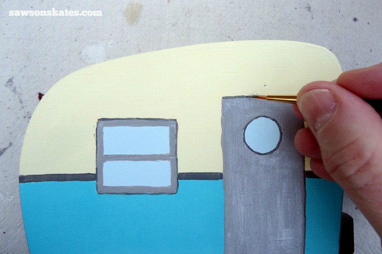 This simple trick will make you look like a freehand painting pro - Use a fine artist brush and a darker color to outline elements on the project. This gives the piece a finished look and makes the elements pop.