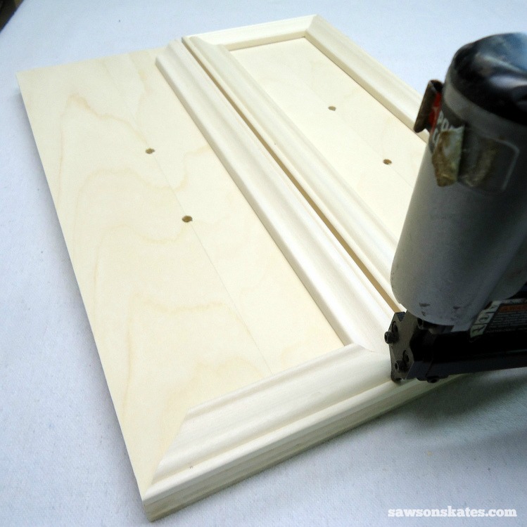 Small DIY Bathroom vanity plans - wrap the drawer fronts with moulding