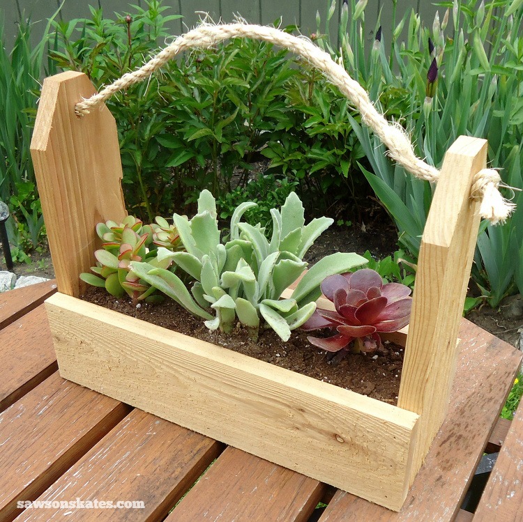 These wooden DIY outdoor planters are practically FREE... they're all made with scrap wood - Rustic Tool Caddy Planter
