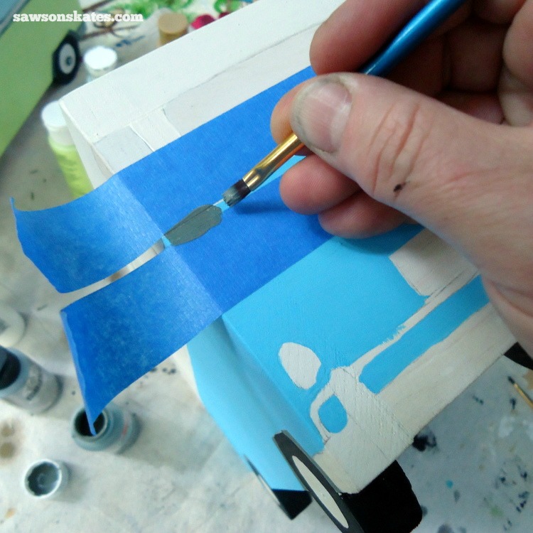 This simple trick will make you look like a freehand painting pro - Use painter's tape for straight lines