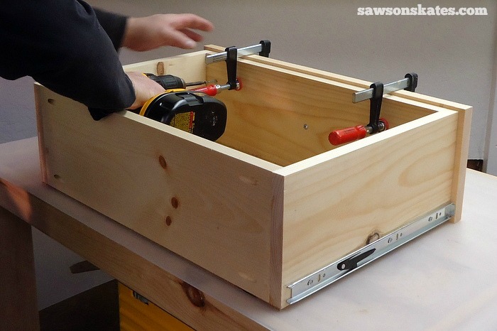 Remove the Retro Nightstand drawer, drill countersink holes and attach the drawer box to the drawer front using 1-1/4