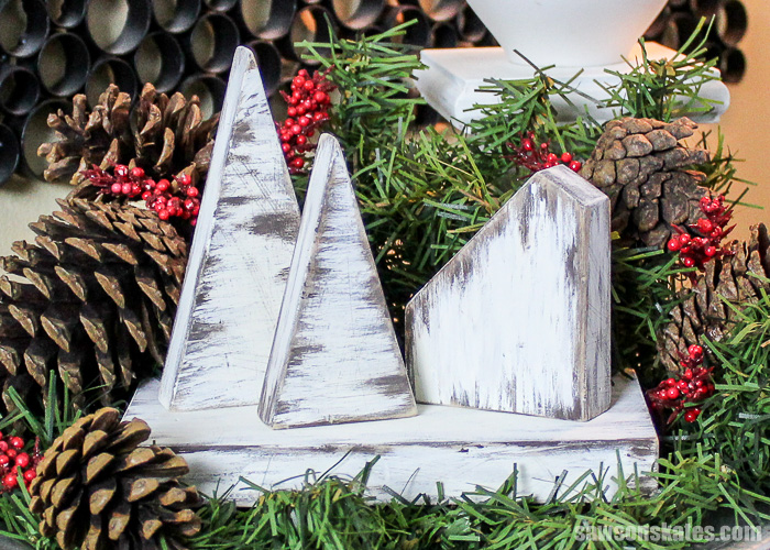 This rustic DIY Christmas Village was made with scrap wood and finished with chalk paint. It's an easy project that only takes about 30 minutes to make.