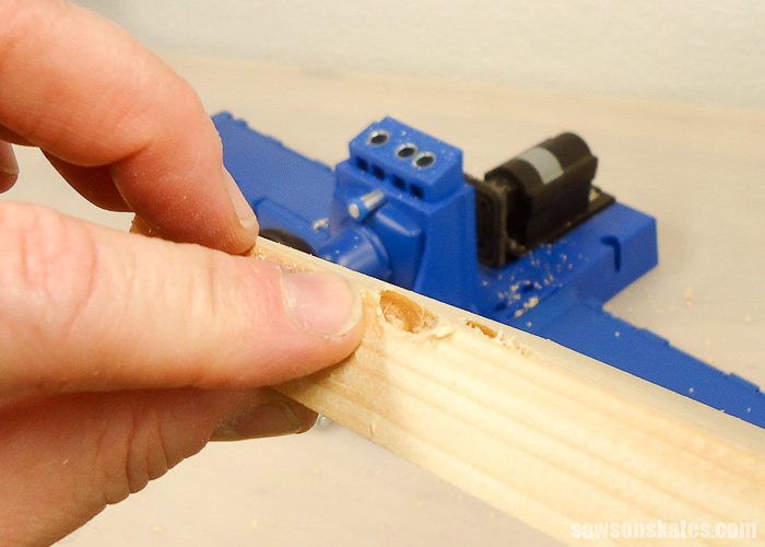 Drilling pocket holes on miter joints - And here's a pocket hole drilled through the edge of the board. This is NOT an attractive look for our DIY furniture projects