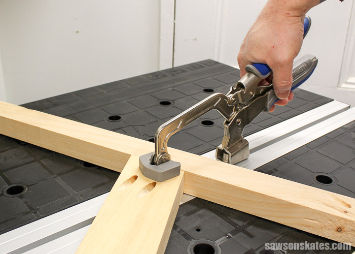 Best Workbench Features - The Mobile Project Center includes a bench clamp that can be mounted to the tabletop using the T-slot.