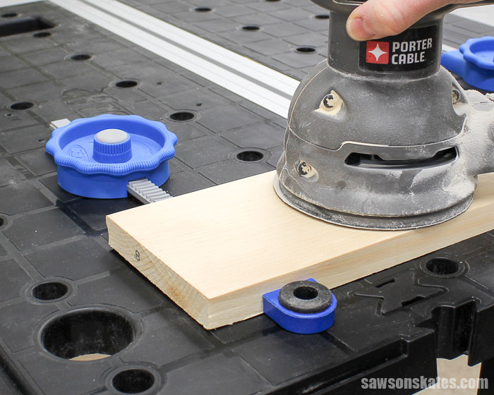 Best Workbench Features - Bench dogs combined with Kreg In-Line Clamps make the Mobile Project Center the best place to sand your DIY project.