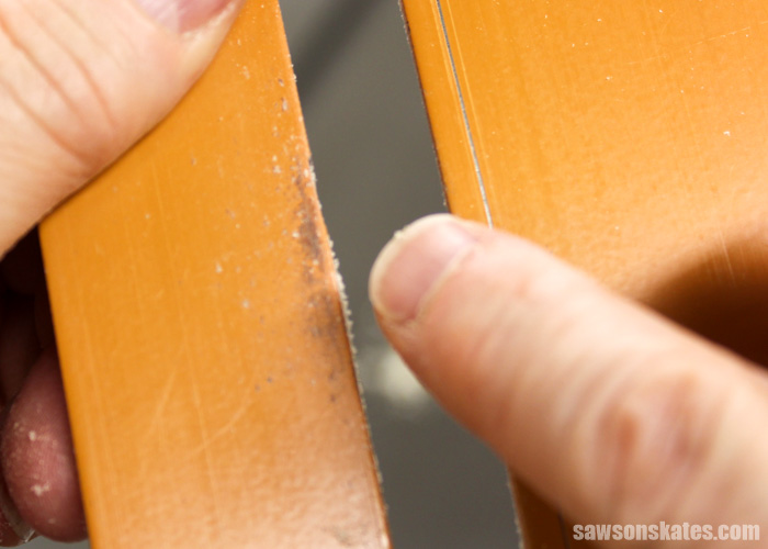 Wax your table saw to remove pitch and resin that builds up over time