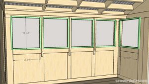 Attaching the interior window trim into the DIY truck bed camper