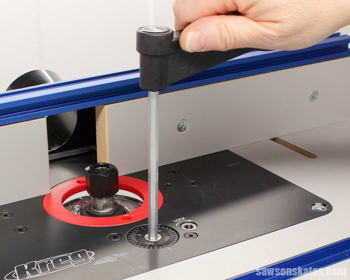 The micro-adjustment dial on the Kreg Precision Router Lift raises and lowers the router.