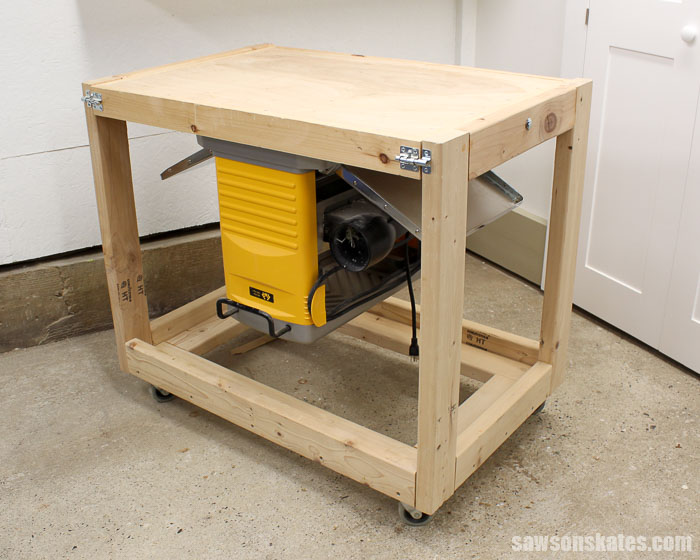 Side view of the flip top workbench in the closed position