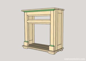 Attaching the molding to the DIY electric fireplace surround and TV stand