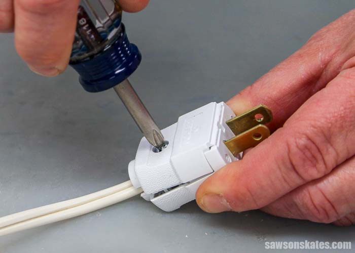 Closing the cover of a replacement plug is the last step to wiring a plug.