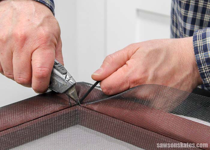 Cutting the excess spline when replacing a window screen