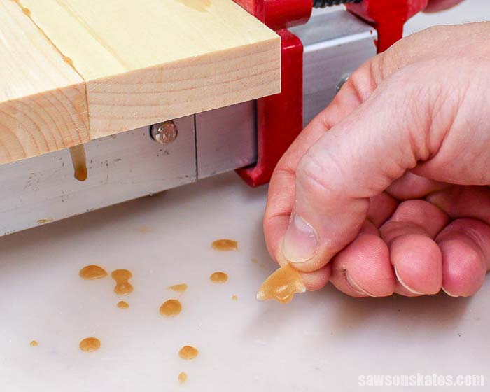 A workbench mat prevents glue from sticking to a bench top.