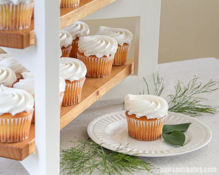 A DIY cupcake stand with a cupcake on a white plate