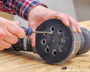 Loosen the screws from the sander pad of my orbital sander