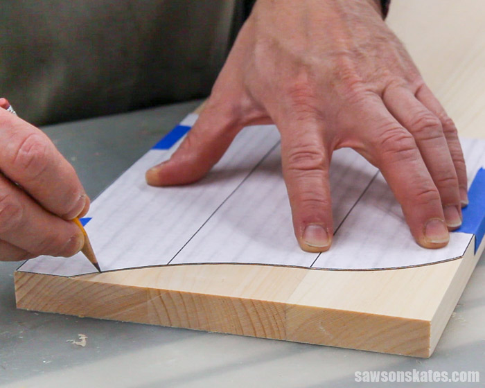 Tracing the curved detail on the side of a DIY display cabinet