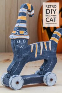 This DIY Halloween cat decoration is purrfect for your haunted house or mausoleum. All you need to do is scare up some scrap wood and craft paints. Don’t be frightened by the spooky details of this retro-style project. The printable template makes it easy.