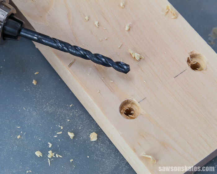 A drill bit used to make mounting holes for wall-mounted DIY shelf brackets