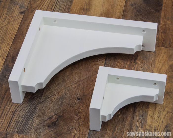 Large and small DIY shelf brackets made with scrap wood