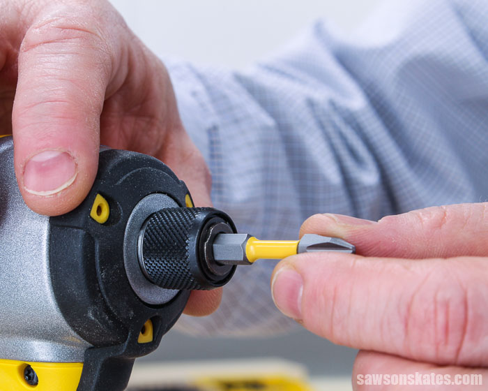 Putting a screwdriver bit in an impact driver