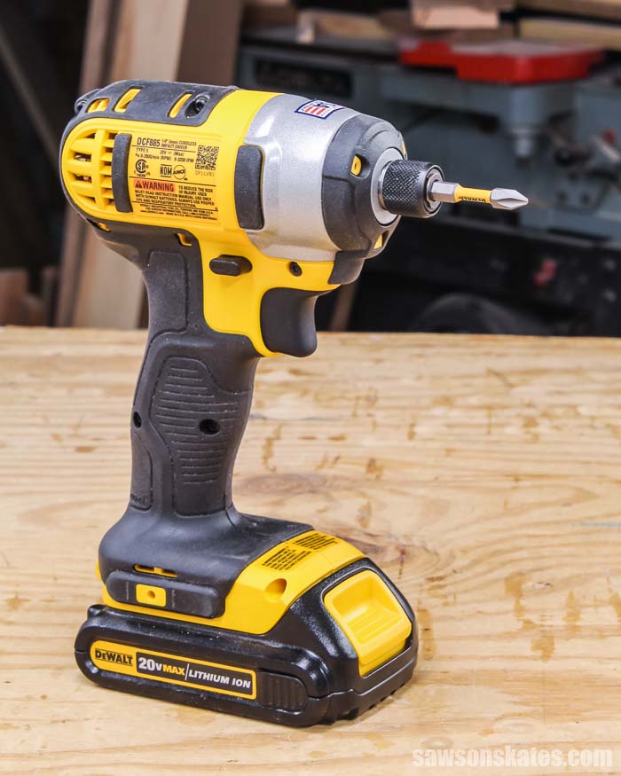 Impact driver on a wood workbench