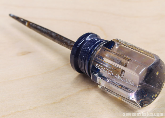 Close up of the hande of a scratch awl used for woodworking