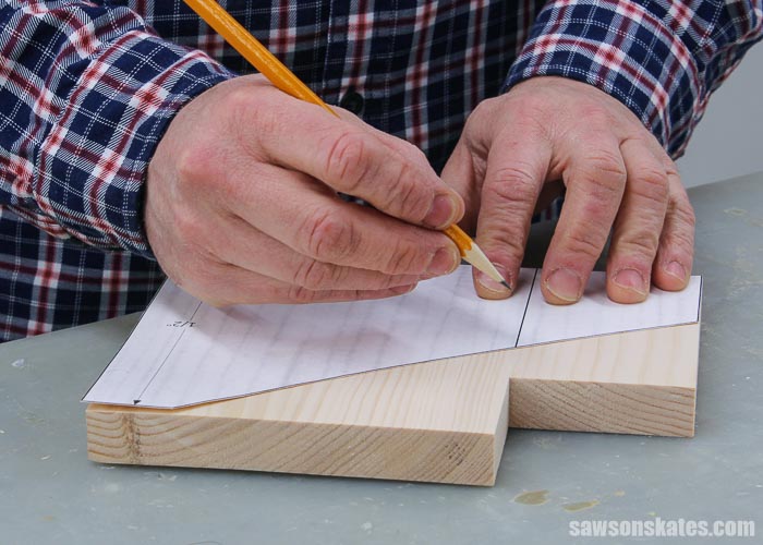 Tracing the template on the side of a  DIY 3 tier spice rack