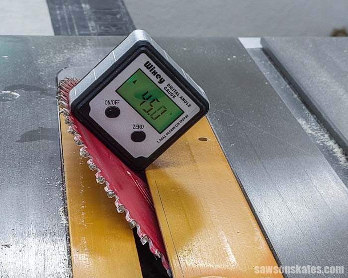 Using a digital angle finder to set the blade angle of a table saw to make a DIY french cleat
