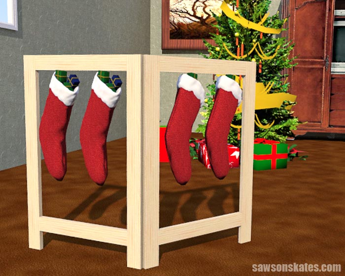 Looking for a unique way to hang your Christmas stockings? This simple, attractive DIY stocking holder stand is easy to make and folds flat for storage.