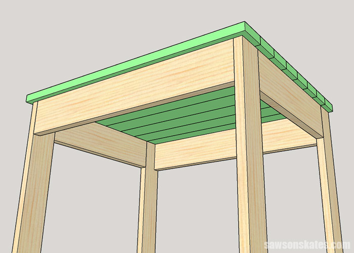 Sketch showing how to attach the desktop to the leg assemblies for a DIY writing desk