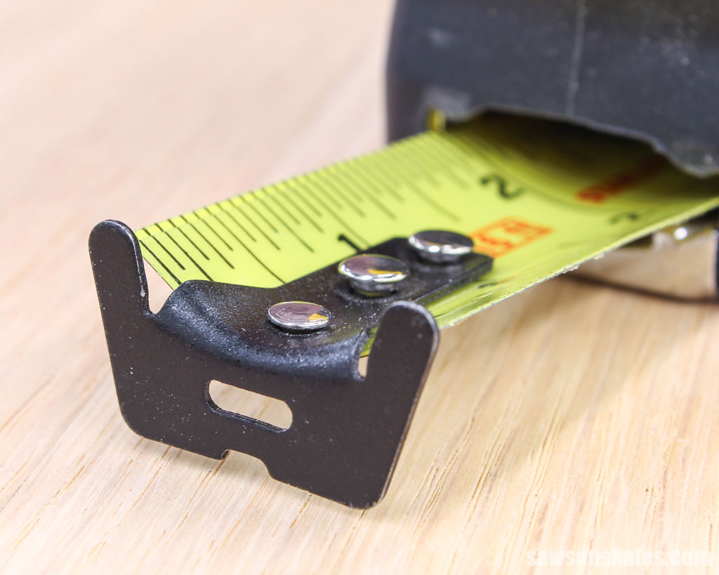 Closeup of a measuring tape's hook