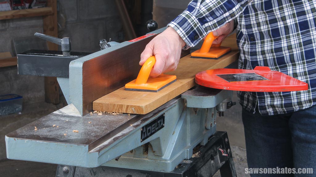 Using a jointer to joint the face of a board