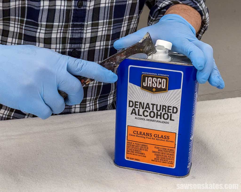 Opening a container of denatured alcohol