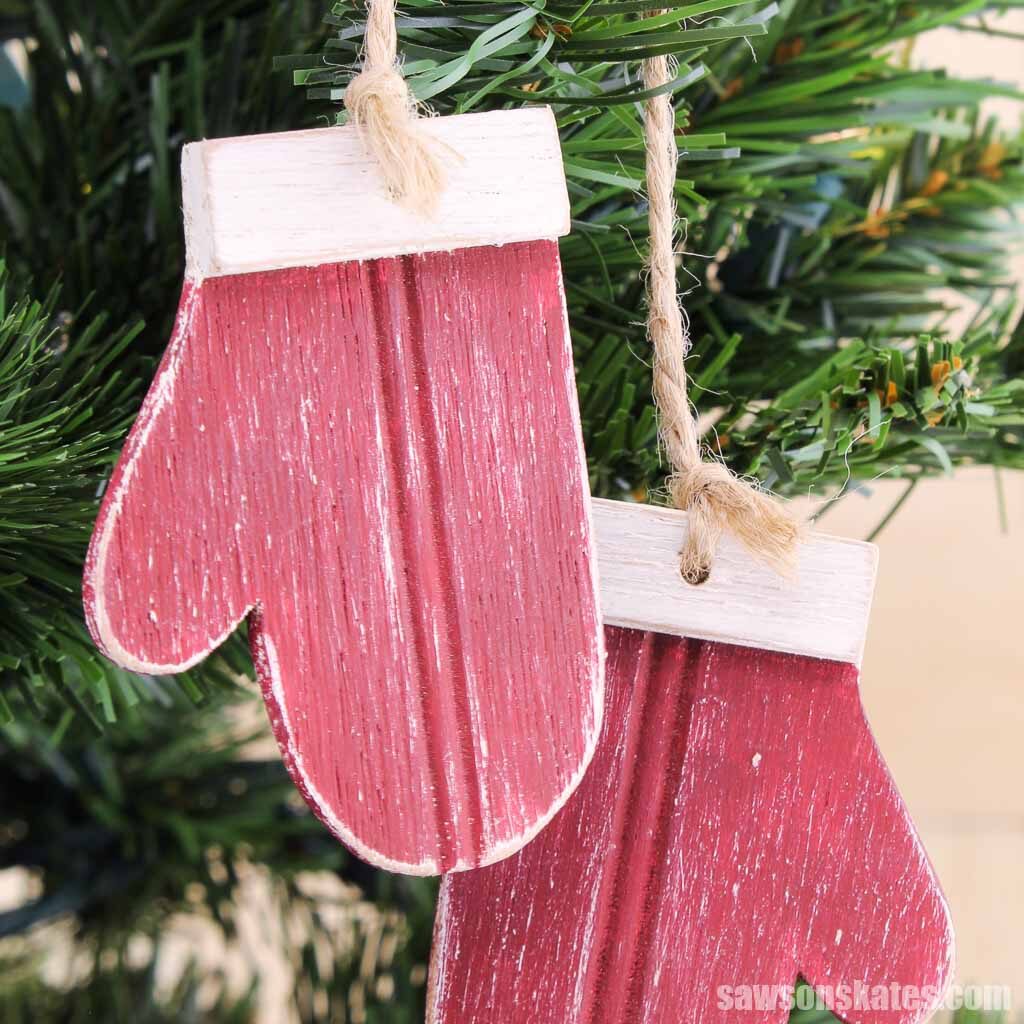 Mitten-shaped Christmas ornaments made with scrap pieces of beadboard