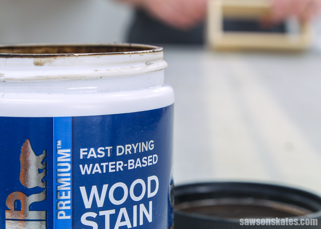 Closeup of the words water-based on a container of wood stain