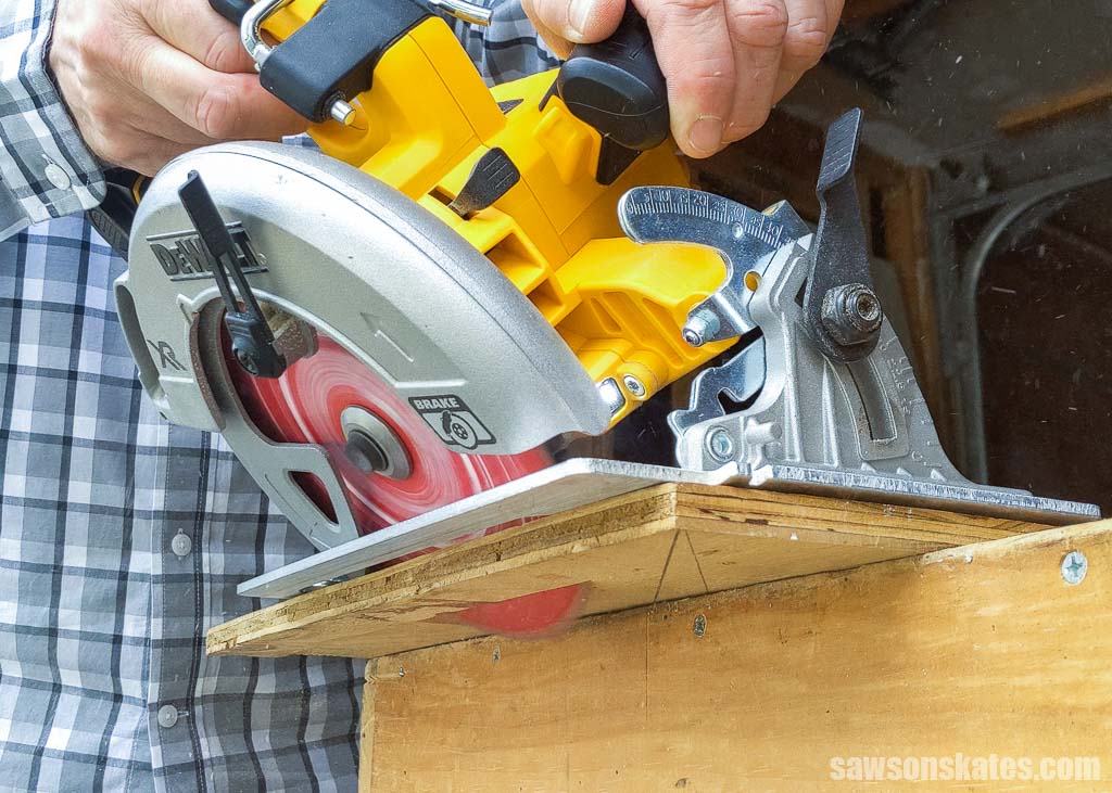 Using a circular saw to make a bevel cut on a piece of plywood
