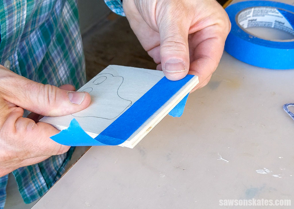 Using painter's tape to join two blanks together for a DIY ice skate ornament