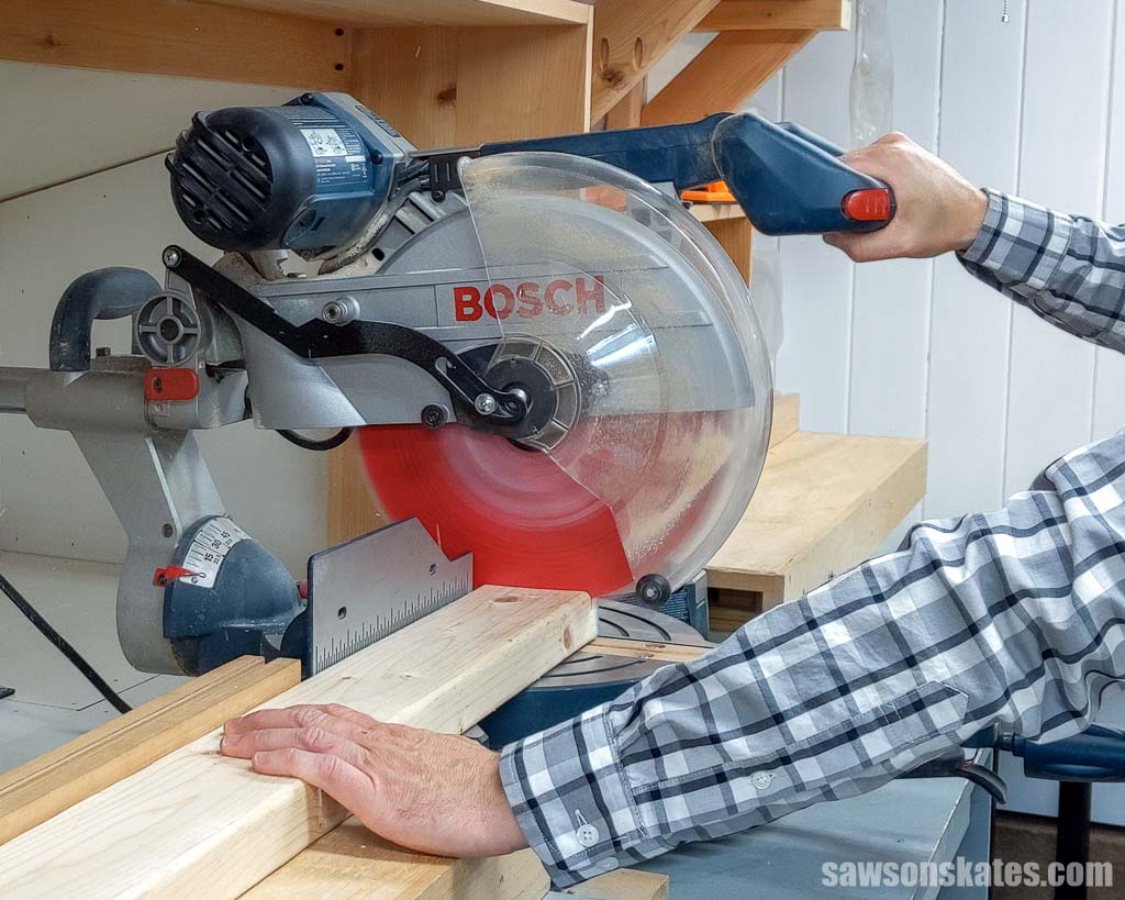 Using a dual bevel miter saw to cut a board to length