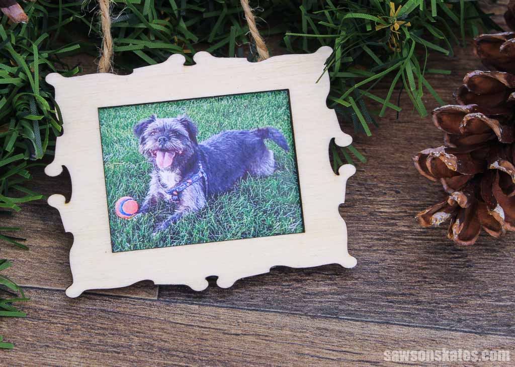 Christmas photo frame ornament with a picture of a dog