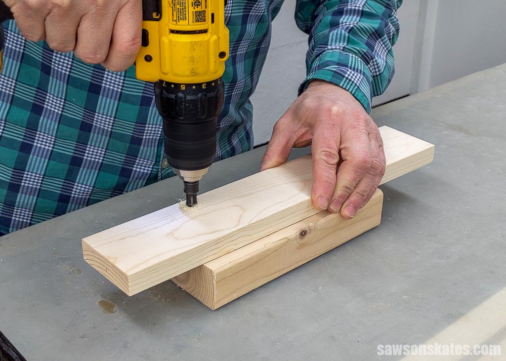 Using a drill to make a countersink hole