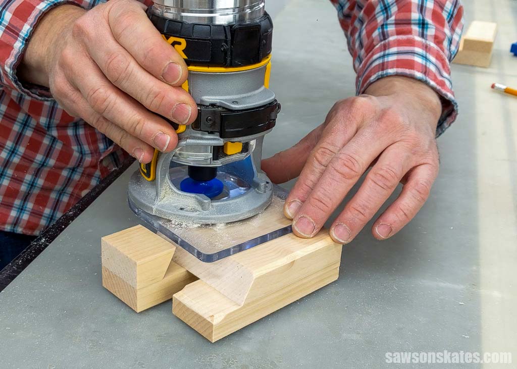 Using a cordless router to chamfer the top edge of a DIY phone stand