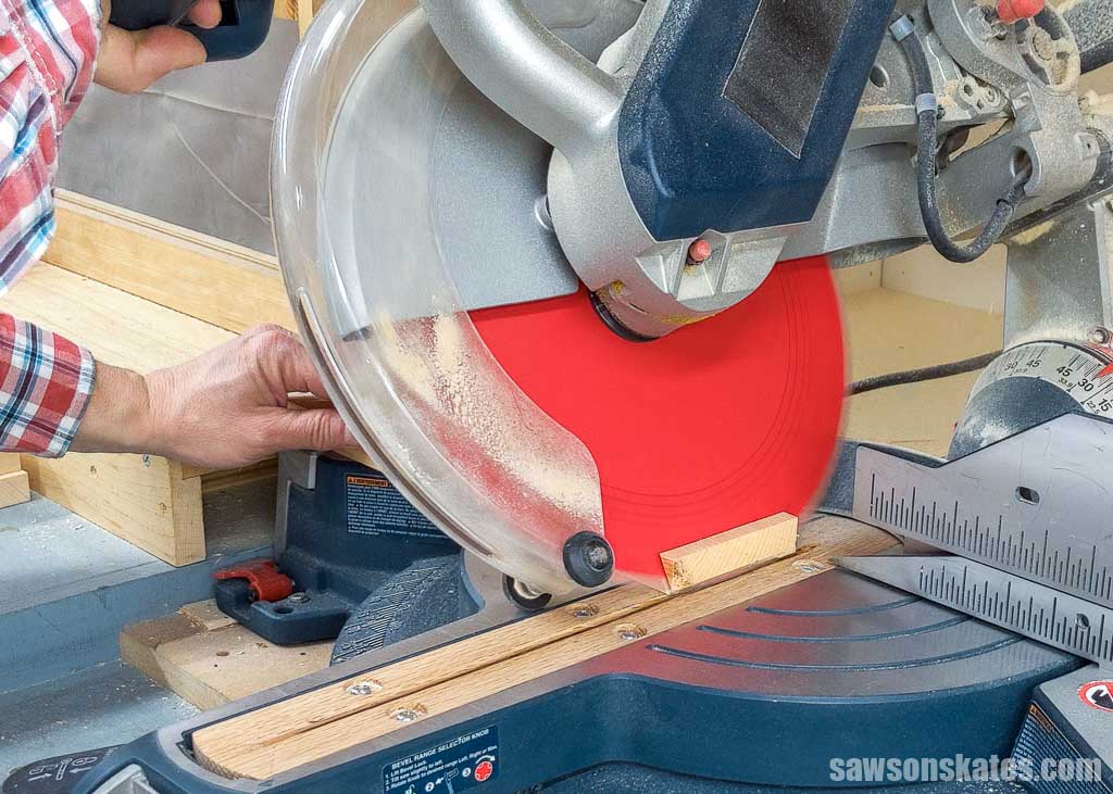 Using a miter saw to cut a bevel on the end of a board