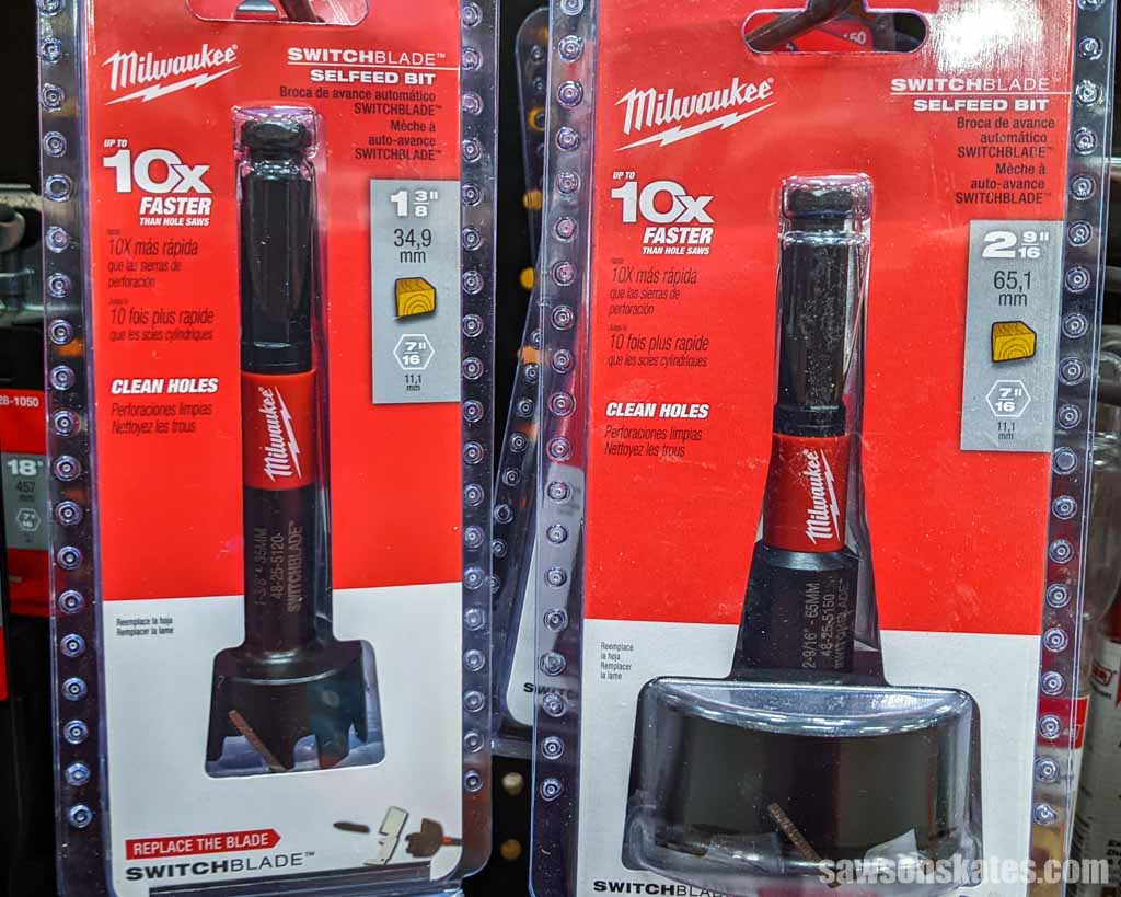 Package of self feeding drill bits hanging on store display