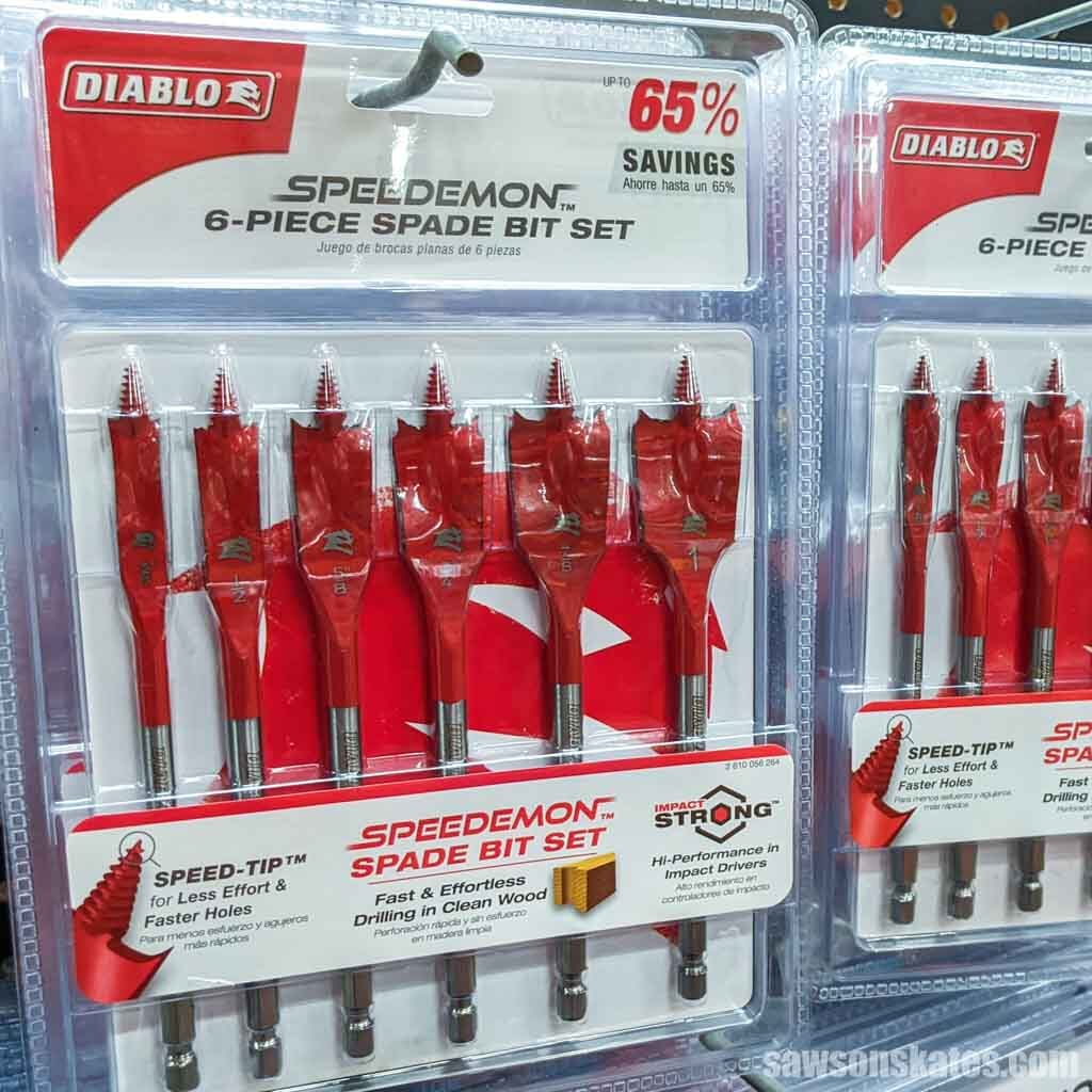 Package of spade drill bits hanging on store display
