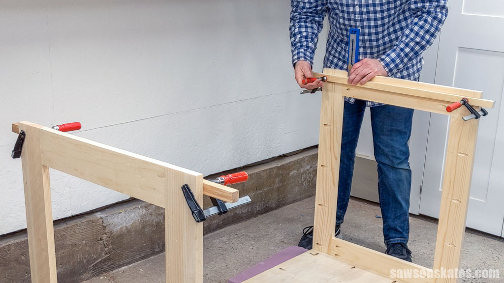 Using a Kreg Multi-Mark to position a board on the side of a DIY workshop utility cart