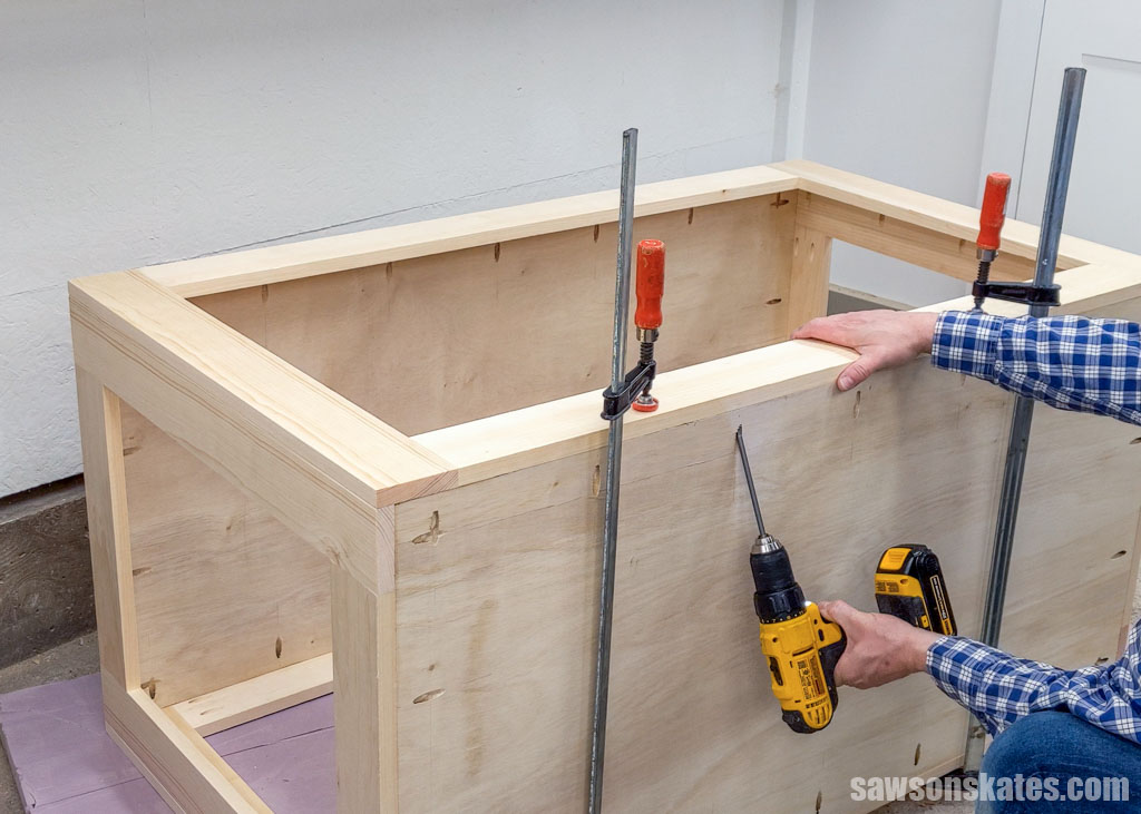Attaching the front assembly to a DIY rolling shop cart using a drill