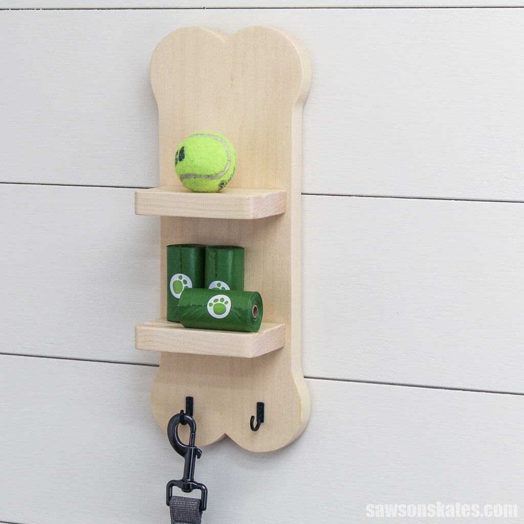 Side view of a DIY dog leash holder with two shelves